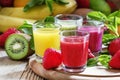 Fruit and berry freshly squeezed smoothies, selective focus Royalty Free Stock Photo