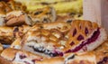 Fruit berry pie pieces in bakery
