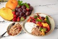 Fruit berry salad with yogurt and granola for healthy breakfast