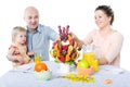 Fruit bouquet decoration on the dining table in front of happy f