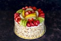 Fruit cake on dark background. celebration cake.  Close up Royalty Free Stock Photo