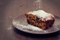 Fruit cake on dark plate