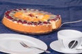 Fruit cake with empty coffee cup and cake plate Royalty Free Stock Photo