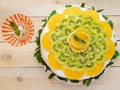 Fruit cake (orange, kiwi, mint) with a glass, Royalty Free Stock Photo