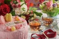 Fruit cake, a piece on a plate with dried fruits. Wood background