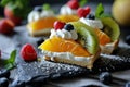 Fruit cake with whipped cream and fresh berries on a black background Royalty Free Stock Photo