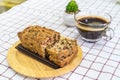 Fruit Cake on wooden plate and coffee cup Royalty Free Stock Photo