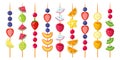 Fruit canapes mix on wooden skewers. Strawberries, blueberries, raspberries, watermelon, kiwi, banana, tangerine