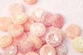 Fruit candy scattered on a pink background Royalty Free Stock Photo