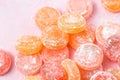 Fruit candy scattered on a pink background close up Royalty Free Stock Photo