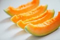 Fruit cantaloupe cut close-up white background Royalty Free Stock Photo