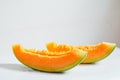 Fruit cantaloupe cut close-up white background Royalty Free Stock Photo