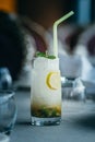 Fruit cocktail, lemon. Photo of drinks on a dark background