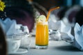 Fruit cocktail, orange. Photo of drinks on a dark background Royalty Free Stock Photo