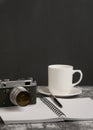 Photo camera in grey stuff surrounding closeup Royalty Free Stock Photo