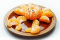 Fruit crab, a snack made of fresh parts of tangerines served in the shape of crab