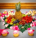 Fruit and Cupcake Arrangement with Pineapple Centerpiece