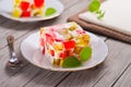 Fruit dairy, red and green jelly on a plate. Royalty Free Stock Photo