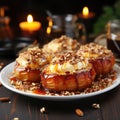 Baked apples filled with nuts on a plate on the rustic wooden table.