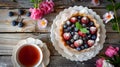 Fruit Dessert with Tea on Wooden Table Royalty Free Stock Photo