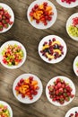 Fruit diet. Fruits on a plate on a wooden background. Healthy food Royalty Free Stock Photo