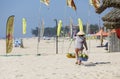 Fruit and drink seller walk in a beach in Nam Tien, Vietnam Royalty Free Stock Photo