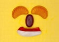 Fruit face clownish orange slices Royalty Free Stock Photo