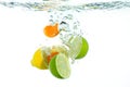 Fruit falling in water Royalty Free Stock Photo