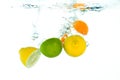 Fruit falling in water Royalty Free Stock Photo