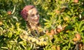 Fruit farmer woman inspecting her apple orchard