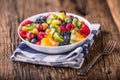 Fruit fresh mixed tropical fruit salad. Bowl of healthy fresh fruit salad - died and fitness concept Royalty Free Stock Photo