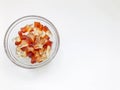 Fruit gelatinous sweets. the bottle-shaped marmalade is in a small, round and transparent plate. making homemade sweets. baby