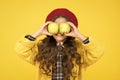 Fruit glasses. Little girl have fun with apples fruit yellow background. Small child hold healthy fruit. School snack Royalty Free Stock Photo