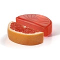 Fruit grapefruit caramel along with a piece of grapefruit Royalty Free Stock Photo