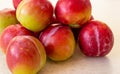 Fruit harvest. Fresh fruits. Apricot, peach, plums, nectarines on a wooden background. A lot of peaches, plums, apricots on the Royalty Free Stock Photo