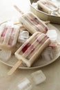 Fruit healthy berry ice cream. Homemade popsicle lolly with strawberries, blueberries and bananas Royalty Free Stock Photo