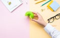 Fruit and healthy concepts with young female holding green apple on desk worktable background.organic and nature food