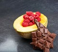 Fruit, healthy raspberries or chocolate in kitchen for balanced diet, nutrition or natural vitamin A. Vegan, wellness or