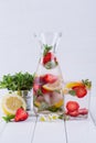 Fruit and herb infused water. Cold refreshing vitamin water. Summer drink Royalty Free Stock Photo