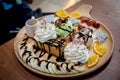 Fruit honey toast. dessert on the wood plate that is Toast and i Royalty Free Stock Photo