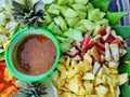 Fruit with hot chili paste. indonesian traditional Traditional Mix fruit salad with peanut sauce
