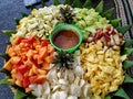 Fruit with hot chili paste. indonesian traditional Traditional Mix fruit salad with peanut sauce