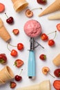 Fruit ice cream in scoop spoon and waffle cones with berries Royalty Free Stock Photo