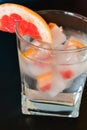 Fruit in ice cubes in water Royalty Free Stock Photo