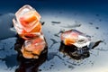 Fruit in ice cubes in water