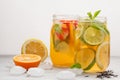 Fruit ice tea and ginger herbal ice tea with mint in a glass jar Royalty Free Stock Photo