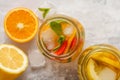 Fruit ice tea and ginger herbal ice tea with mint in a glass jar Royalty Free Stock Photo