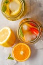 Fruit ice tea and ginger herbal ice tea with mint in a glass jar Royalty Free Stock Photo