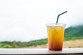 Italian iced soda with mountain view background to get the freshness in summer time Royalty Free Stock Photo