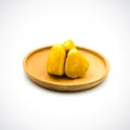 Fruit jackfruit in a wooden plate Isolated on the white background Royalty Free Stock Photo